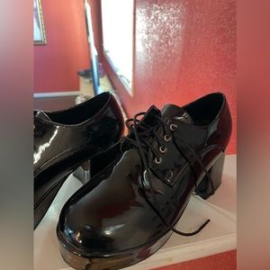 Blacked heeled platforms